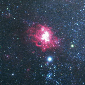 すばる望遠鏡により撮影された「さんかく座星雲」の全体像（写真上）と、その一部をクローズアップしたもの